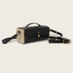 Petit sac bandoulière en cuir naturel à tannage végétal et bois, noir autruche, Le Minimum +Petit sac bandoulière en cuir naturel à tannage végétal et bois, jaune et marron papaya, Le Minimum +